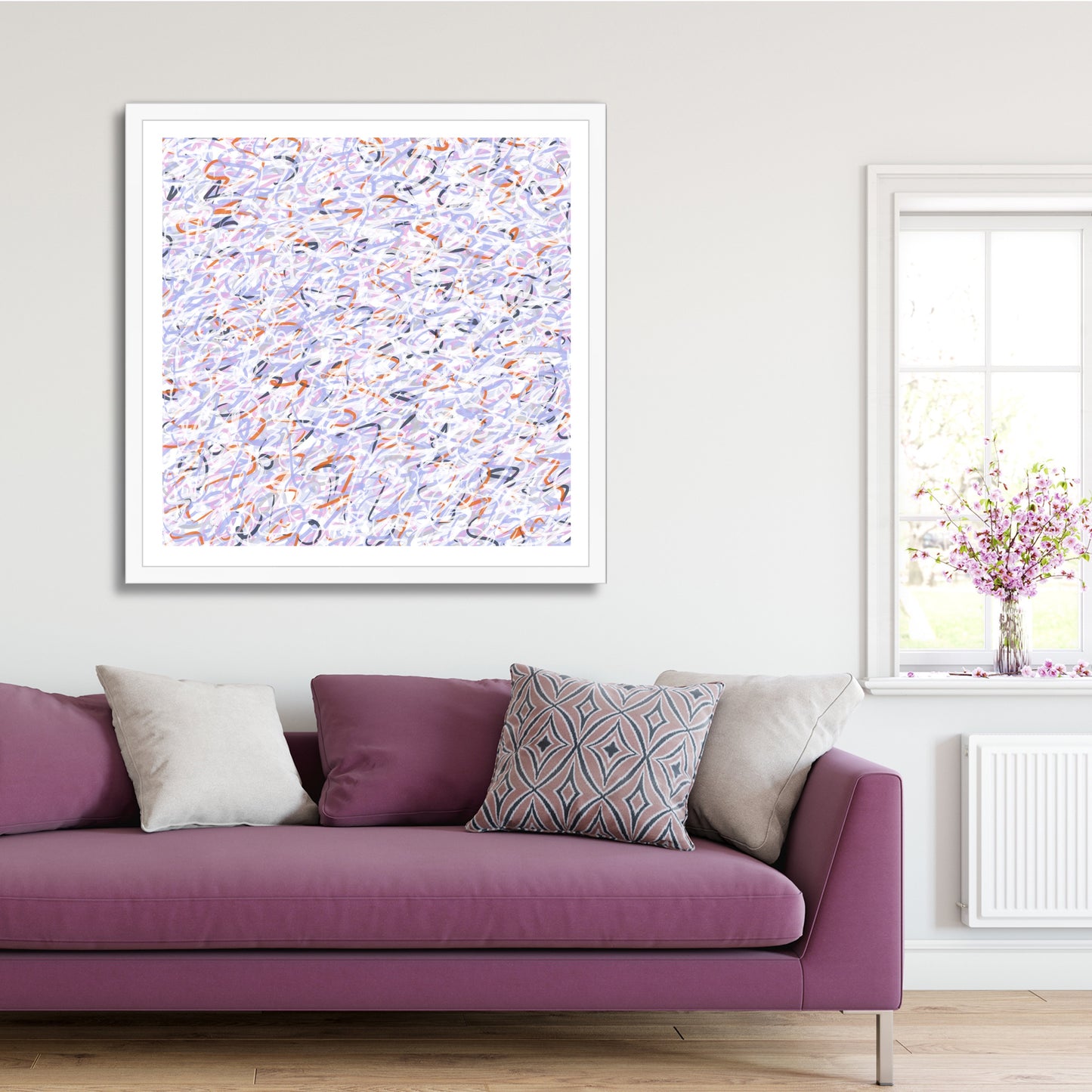'Snowmelt' hangs on a white wall above a muted pink sofa with a white-framed window to one side and, on the window sill, a loosely arranged bunch of pink blossom that has dropped petals onto the sill.